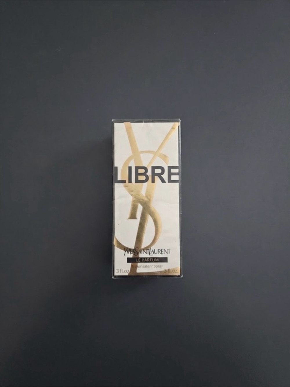 Yves Saint Laurent Gold and White 'LIBRE' Minimalist Wall Art